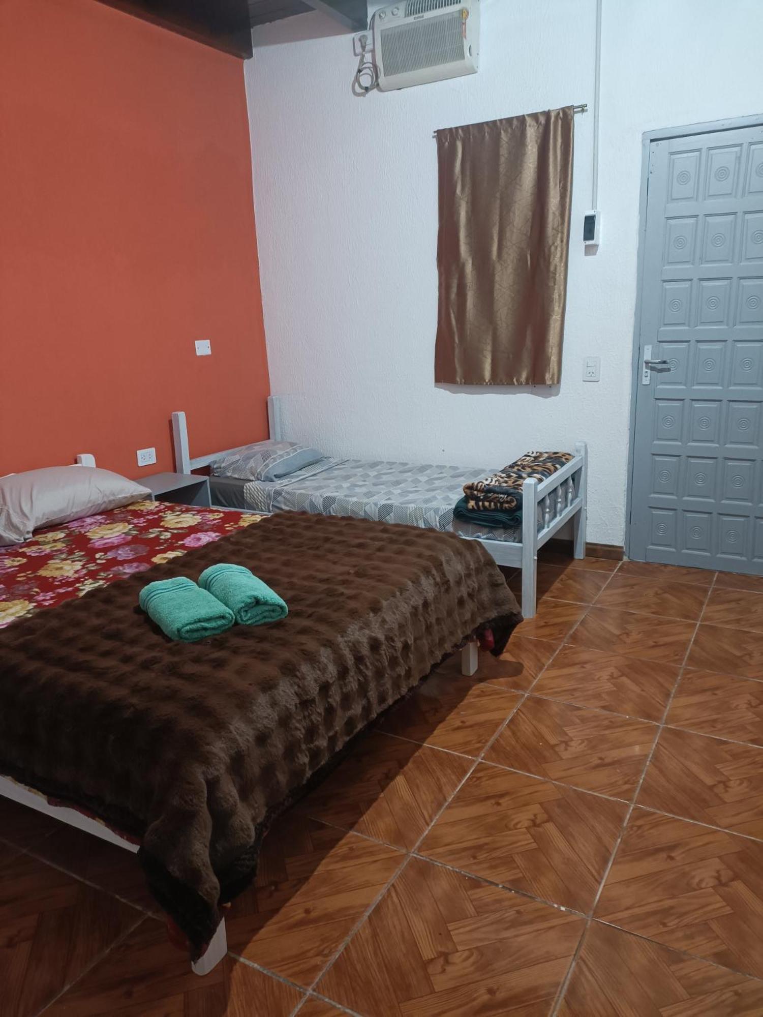 Hostel El Amanecer Пуэрто-Игуасу Экстерьер фото