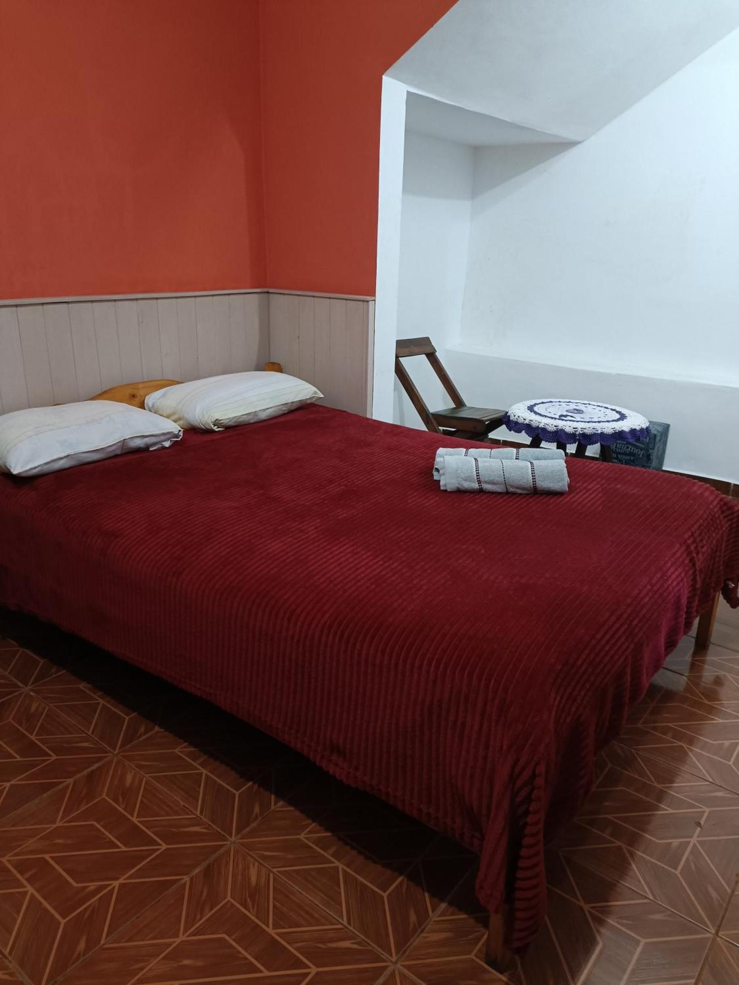 Hostel El Amanecer Пуэрто-Игуасу Номер фото